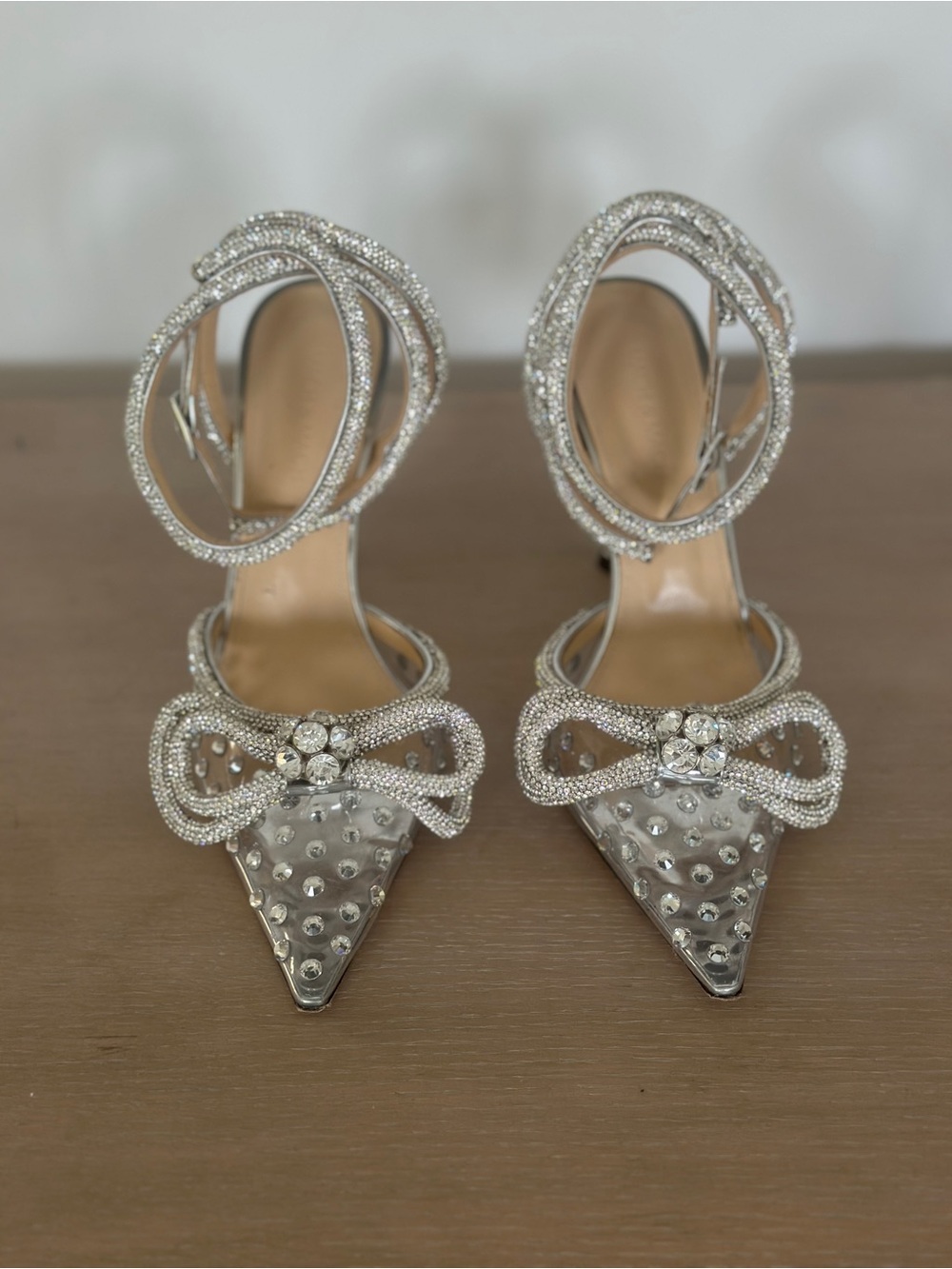 Crystal Bow Pointed-Toe Ankle-Strap Heels in Silver